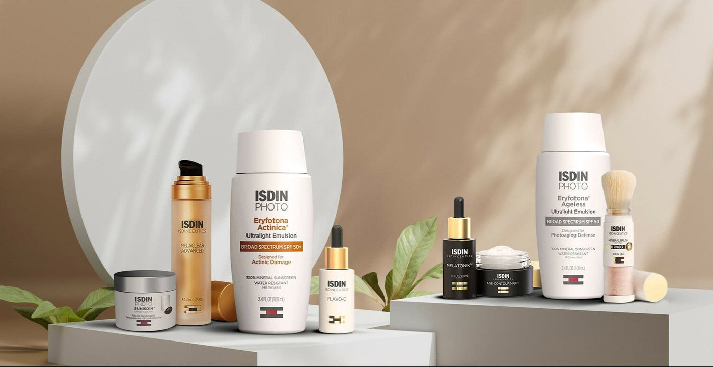 ISDIN skincare products on a neutral background with the ISDIN logo.